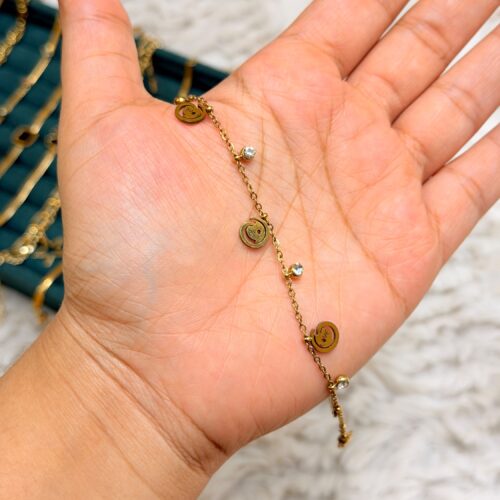 Gold-Plated Smiley Face and Crystal Charm Station Bracelet