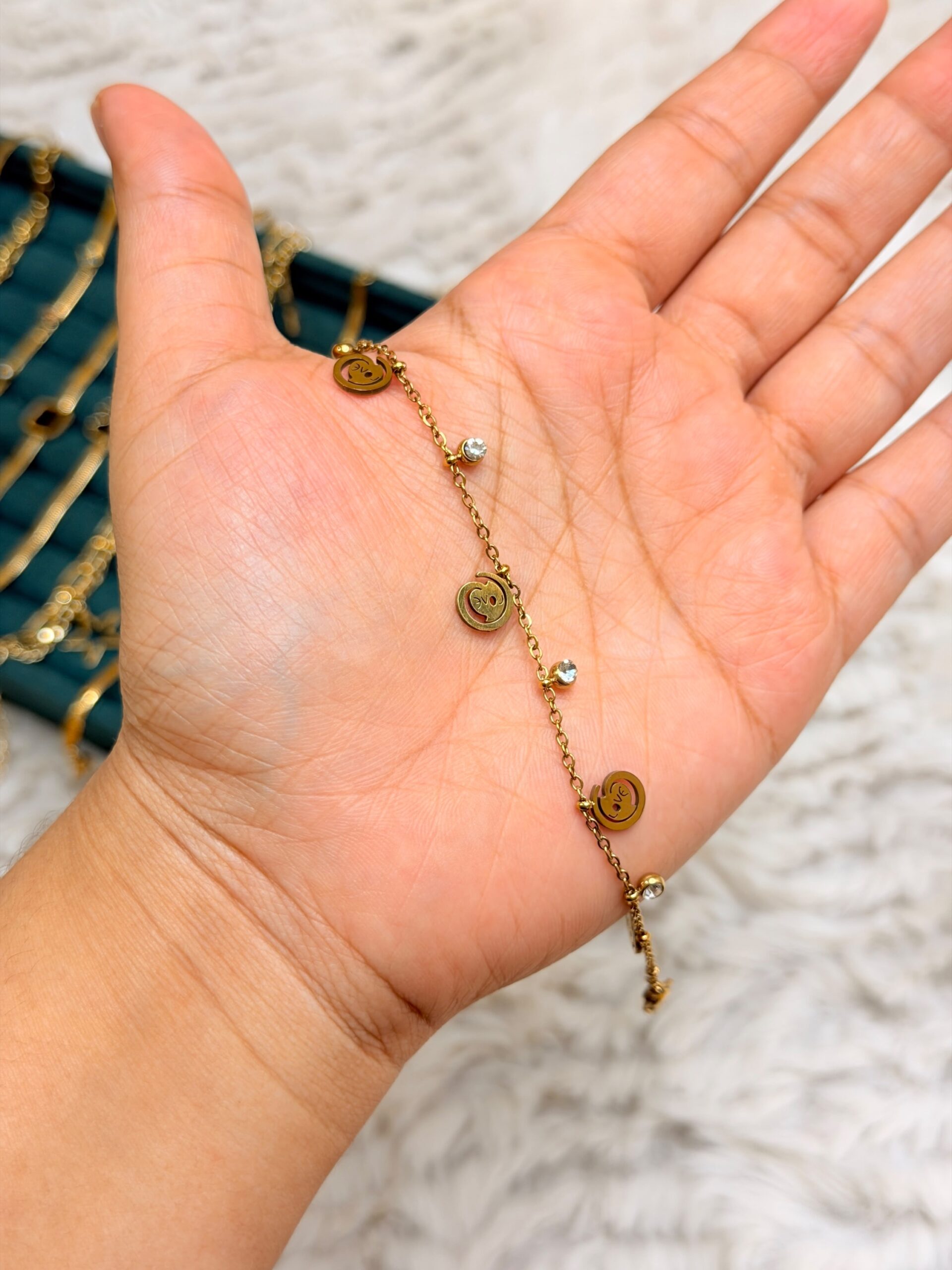 Gold-Plated Smiley Face and Crystal Charm Station Bracelet